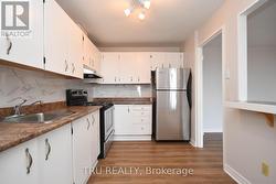 Kitchen 10' 10\" x 8' 1\" - 