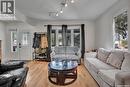 213 H Avenue N, Saskatoon, SK  - Indoor Photo Showing Living Room 