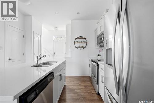 3270 Chuka Boulevard, Regina, SK - Indoor Photo Showing Kitchen With Stainless Steel Kitchen With Double Sink