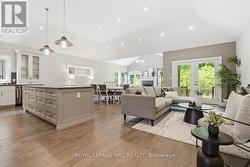 Living room on right has glass door to back patio - 