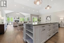 Kitchen view into dining rm- sunroom in foreground - 