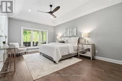 Huge primary bedroom with 3 panel window... - 