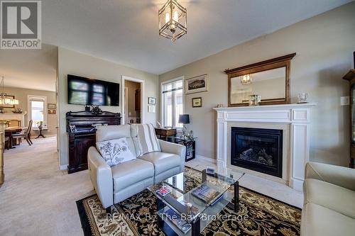 100 Allegra Drive, Wasaga Beach, ON - Indoor Photo Showing Living Room With Fireplace