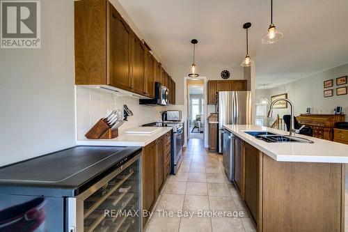 100 Allegra Drive, Wasaga Beach, ON - Indoor Photo Showing Kitchen With Double Sink With Upgraded Kitchen