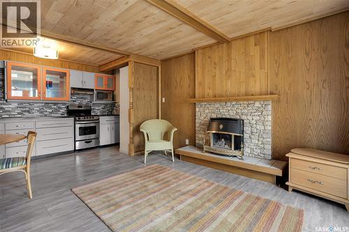 444 Q Avenue N, Saskatoon, SK - Indoor Photo Showing Living Room With Fireplace