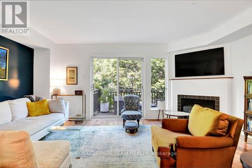 7 Academy Private, Ottawa, ON - Indoor Photo Showing Living Room With Fireplace