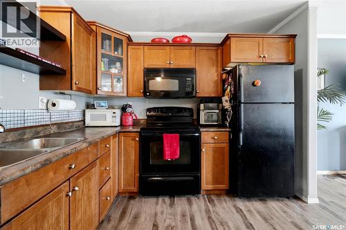 705 1022 Hampton Circle, Saskatoon, SK - Indoor Photo Showing Kitchen With Double Sink