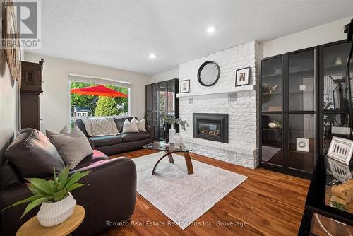 109 Ashberry Place, Waterloo, ON - Indoor Photo Showing Living Room With Fireplace