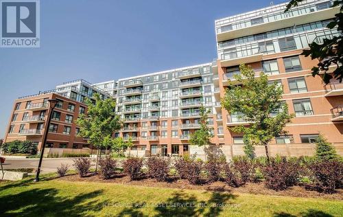 301 - 11611 Yonge Street, Richmond Hill, ON - Outdoor With Balcony With Facade