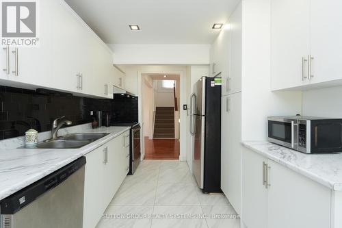 29 - 6780 Formentera Avenue, Mississauga, ON - Indoor Photo Showing Kitchen With Double Sink