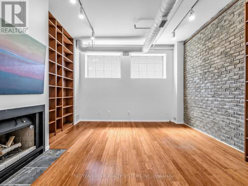 5 - 6 Bartlett Avenue W, Toronto, ON - Indoor Photo Showing Other Room With Fireplace