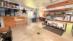 Garage and shop (10x10 storage under shop) - 