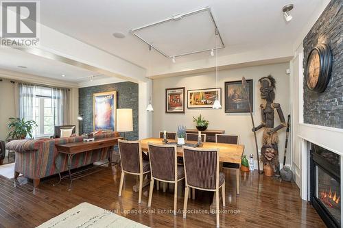 20 - 4135 Shipp Drive Ne, Mississauga, ON - Indoor Photo Showing Dining Room With Fireplace