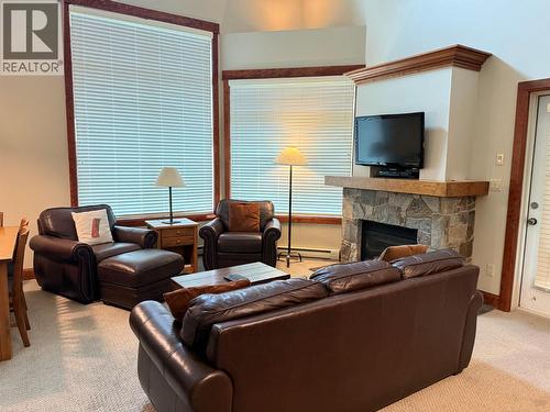 4559 Timberline Crescent Unit# 545A, Fernie, BC - Indoor Photo Showing Living Room With Fireplace