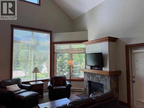 4559 Timberline Crescent Unit# 545A, Fernie, BC - Indoor Photo Showing Living Room With Fireplace