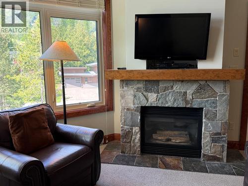 4559 Timberline Crescent Unit# 545A, Fernie, BC - Indoor Photo Showing Living Room With Fireplace