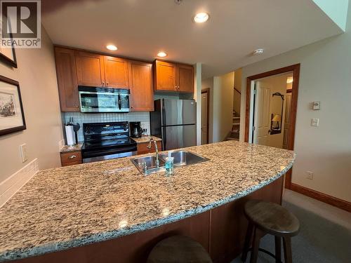 4559 Timberline Crescent Unit# 545A, Fernie, BC - Indoor Photo Showing Kitchen With Double Sink