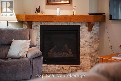 100 Harris Crescent, Southgate, ON - Indoor Photo Showing Living Room With Fireplace