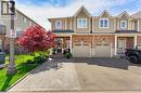 Brick and siding exterior townhouse with gabled roof lines - 100 Chester Drive Unit# 16, Cambridge, ON  - Outdoor With Facade 