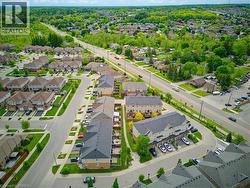 Aerial perspective showcasing a residential community with varied housing styles - 
