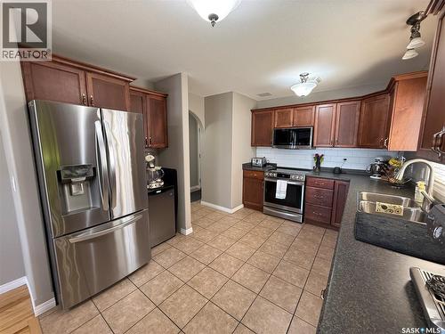 3102 37Th Street W, Saskatoon, SK - Indoor Photo Showing Kitchen With Double Sink