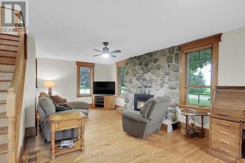 9374 Marvelville Road, Ottawa, ON - Indoor Photo Showing Living Room With Fireplace