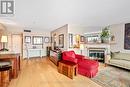 Unit 103 - 103 - 555 Wilbrod Street, Ottawa, ON  - Indoor Photo Showing Living Room With Fireplace 