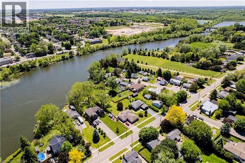 Aerial perspective showcasing a residential area with varied housing styles - 100 Mechanic Street W, Waterford, ON - Outdoor With Body Of Water With View
