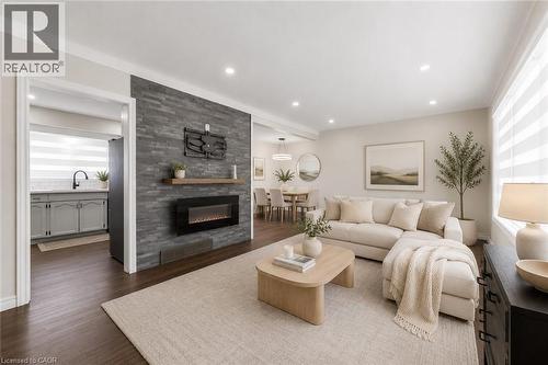 VIRTUALLY STAGED - 5 Armour Drive, Welland, ON - Indoor Photo Showing Living Room With Fireplace