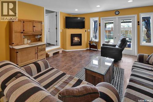 101 Waldbillig Court, Cudworth, SK - Indoor Photo Showing Living Room With Fireplace