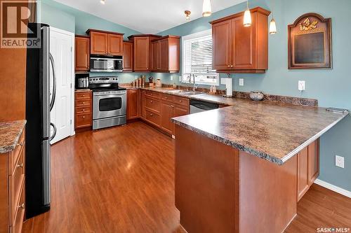 101 Waldbillig Court, Cudworth, SK - Indoor Photo Showing Kitchen With Double Sink