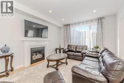 Living room featuring light hardwood / wood-style floors - 