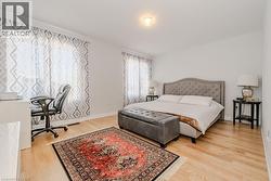 Bedroom with light wood-type flooring - 