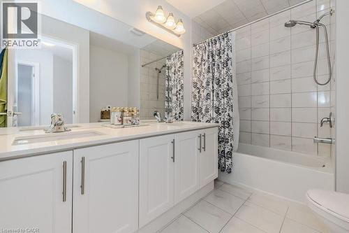 Full bathroom with vanity, shower / bath combination with curtain, and toilet - 53 Mackay Drive, Woodstock, ON - Indoor Photo Showing Bathroom