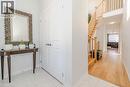 Hall featuring light tile patterned floors and a high ceiling - 53 Mackay Drive, Woodstock, ON  - Indoor Photo Showing Other Room 