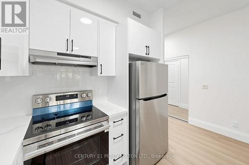 102 - 57 Upper Duke Crescent, Markham, ON - Indoor Photo Showing Kitchen