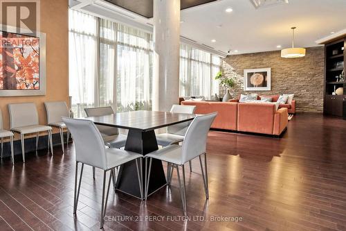 102 - 57 Upper Duke Crescent, Markham, ON - Indoor Photo Showing Dining Room With Fireplace