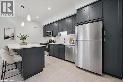 Virtually Staged - 525 Erinbrook Drive Unit# C052, Kitchener, ON - Indoor Photo Showing Kitchen With Stainless Steel Kitchen With Upgraded Kitchen