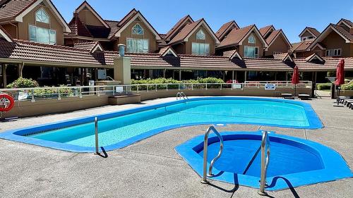 115-1156 Sunset Drive, Kelowna, BC - Outdoor With In Ground Pool