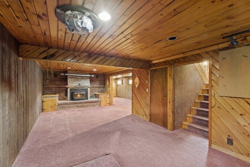Family Room - 1780 Rue Cedar, Mascouche, QC - Indoor Photo Showing Other Room With Fireplace