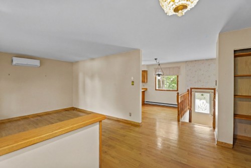 Living Room - 1780 Rue Cedar, Mascouche, QC - Indoor Photo Showing Other Room
