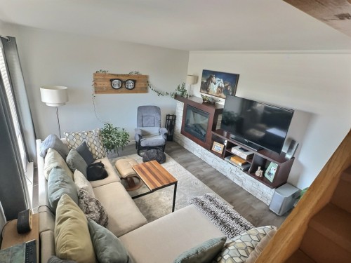 Salon - 123  - 123A Rue Monseigneur-Latulipe E., Rouyn-Noranda, QC - Indoor Photo Showing Living Room With Fireplace