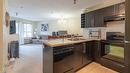 218-1089 Sunset Drive, Kelowna, BC  - Indoor Photo Showing Kitchen With Double Sink 