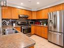 65 Tanglemere Crescent, Brampton, ON  - Indoor Photo Showing Kitchen With Double Sink 