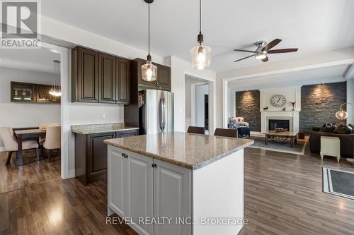 74 Mount Crescent, Essa, ON - Indoor Photo Showing Kitchen With Fireplace