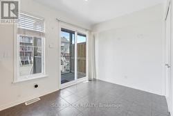 Eat-in kitch leads to back porch and down to grass - 