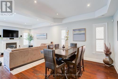 444 Dicenzo Drive, Hamilton, ON - Indoor Photo Showing Dining Room With Fireplace
