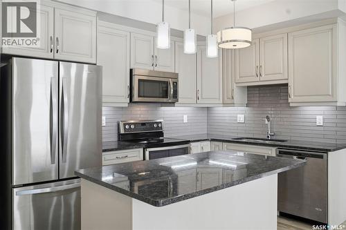 303 1025 Moss Avenue, Saskatoon, SK - Indoor Photo Showing Kitchen With Upgraded Kitchen