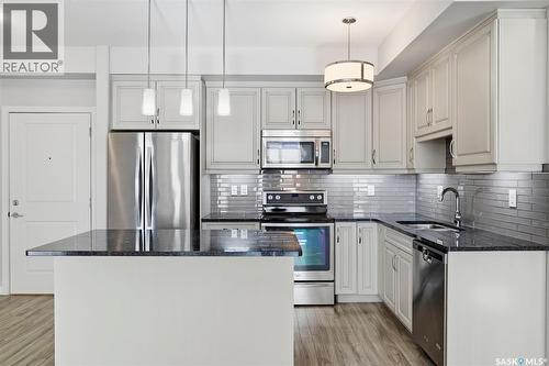 303 1025 Moss Avenue, Saskatoon, SK - Indoor Photo Showing Kitchen With Upgraded Kitchen