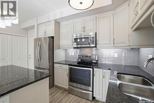 303 1025 Moss Avenue, Saskatoon, SK - Indoor Photo Showing Kitchen With Upgraded Kitchen